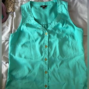 Milano size small turquoise spring top.